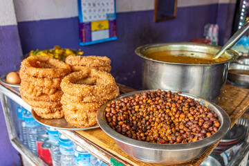 Nepalese food breakfast with Sel Roti and chickpeas. Kathmandu, Nepal.