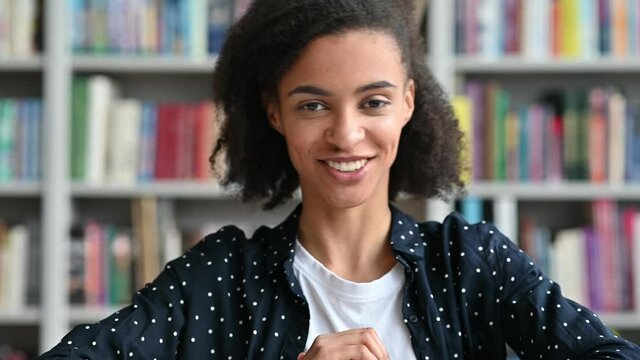 Online video communication. Attractive confident african american modern business woman, teacher or psychologist, communicates with coworker or client by video call,conducts consultation or brainstorm