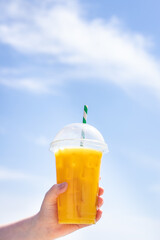 ice drink on the beach cold lemonade soda beverage fresh juice, sea coast shore, summer surf wave background refreshing relax positive mood vacation top view