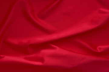 Smooth red satin fabric texture background