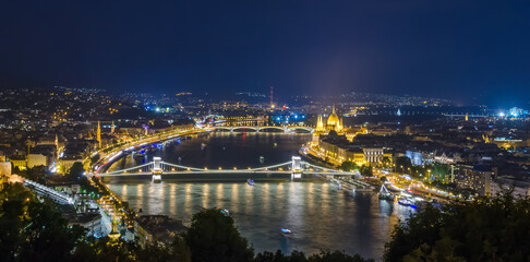 Fototapeta na wymiar Panoramic view of Hungarian Parliament at night, Budapest.
