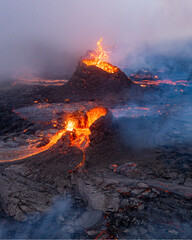 Crater spewing lava at Geldingadalur volcanic eruption in Iceland 2021 - obrazy, fototapety, plakaty