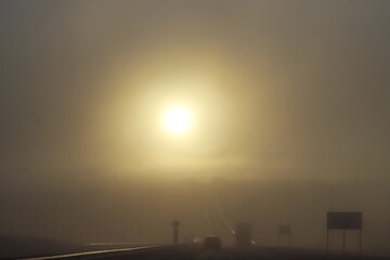 Foggy sunny morning on a highway