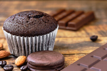 chocolate muffins on a wooden table