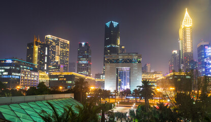 Naklejka premium Dubai, UAE - 05.28.2021 Shot of a Dubai International Financial center at night. Modern architecture