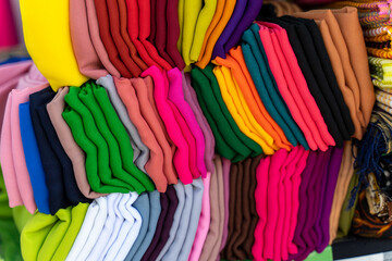 colorful scarves for sale at the market