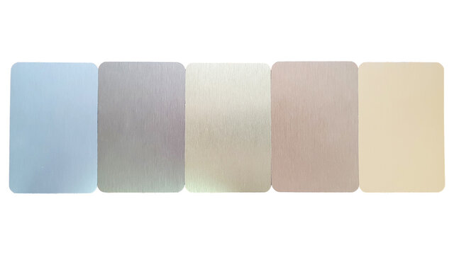 metalic laminated samples showing multi color range including silver ,chrome ,gold ,copper ,rose gold ,white gold colors isolated on white background with clipping path. plastic with a metal coating.