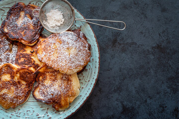 Racuchy – traditional Polish yeast pancakes dusted with icing sugar