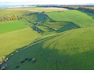 Fototapeta na wymiar Paragliding above the fields at Monks Down in Wiltshire 