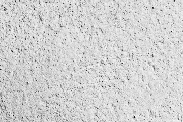 Cracked grey concrete wall