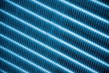 Close up aluminum fin of cooling condenser coil of air condition system. Pattern for abstract background. - obrazy, fototapety, plakaty
