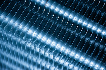 Close up aluminum fin of cooling condenser coil of air condition system. Pattern for abstract background. - obrazy, fototapety, plakaty