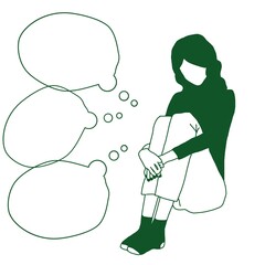 young girl sitting alone hugging her knees