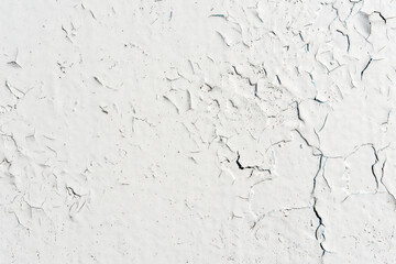 White wall with cracked paint