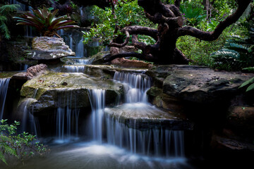 Blurred background,The waterfall at Wat Tham Pha Daen in Sakon Nakhon Province is a new tourist destination.