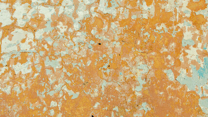 Old concrete wall with crumbling blue and orange paint, backgrounds, textures