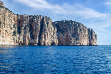 Naklejka premium Rock in the sea. Scenic landscape of rocky coastline in Sardinia, Italy. 