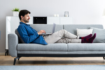 Man Using Laptop Computer