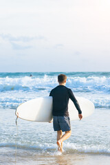 person with surfboard