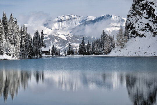 Tea House On Lake Shore By Snow Covered Mounatains. Lake Louise Ski Resort. Banff. Alberta. Canada 