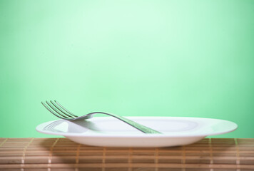 The symbolic white dishes on a bamboo litter