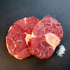 Meat with salt and black background