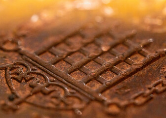 Macro shot of worn 1 pence coin