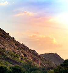 The beautiful mountains and multicolor sky at Indian Rajasthan Village.