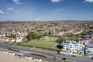 Fototapeta na wymiar Worthing Marine Gardens and Winchelsea Garden on the seafront of West Worthing in West Sussex England. Aerial view.