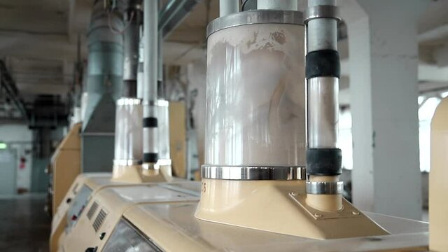 Modern automatic mill for production of white flour from wheat, rice, semolina. Industrial food industry.
