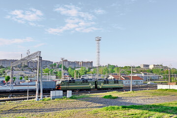 train with cars on the railway tracks