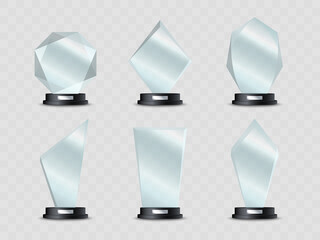 Glass trophies. Realistic crystal awards or acrylic prizes. Winner glass cups on stand. Vector illustration.