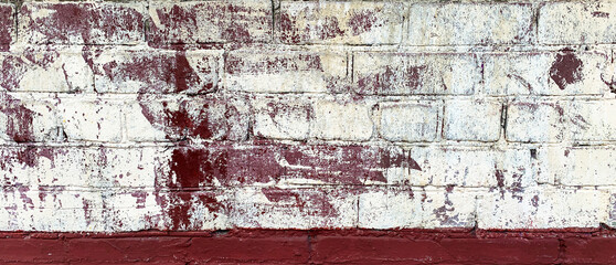 Background of texture of old colored brick. Photo walls of red, white, blue and green clinker...