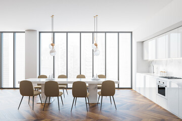 Modern white and beige kitchen and dining room interior