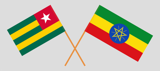 Crossed flags of Togo and Ethiopia. Official colors. Correct proportion