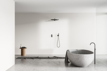 Fototapeta na wymiar Light bathroom interior with shower and bathtub on concrete floor