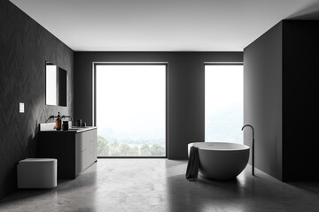 Spacious modern bathroom design interior in grey tones with concrete flooring, freestanding tub, double sink vanity. Panoramic window.