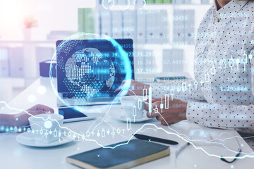 Business people drinking coffee, office tools and earth globe with candlesticks