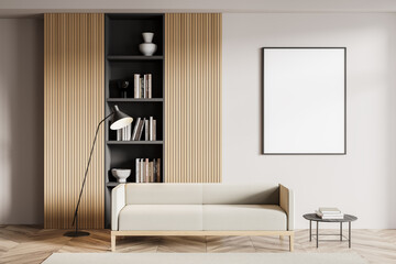 Minimalistic white living room interior with sofa, bookcase and coffee table