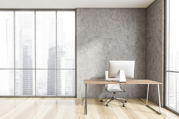 Concrete and wood CEO office with computer desk and window
