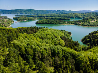 Fototapeta na wymiar Solina Lake in Bieszczady Mountains, Poland. Aerial Drone View. Turquoise Water at Summer.