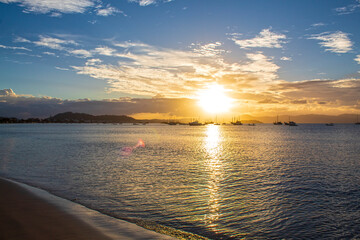 sunset over the sea located on the beach of Cachoeira do Bom Jesus, Canavieiras, Ponta das Canas,...
