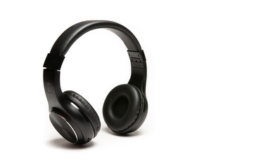 High-quality black headphones on a white background. Headphone product photo, headphone isolated in...