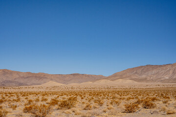 Panamint Dunes Nestled In The Valley Below Panamint Butte