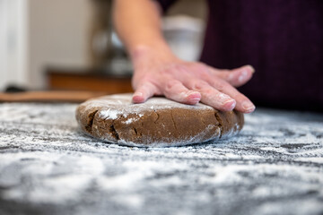 Pressing a Disk of Gingerbread Cookie Dough