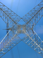 Under Electric Tower and Blue Sky
