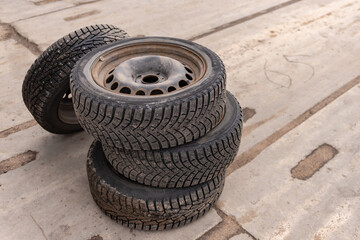 Moscow. Russia. Summer 2020. Winter wheels from the car. Old studded wheels on rusty wheels.