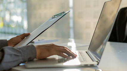 A close job interview focuses on prepared resume writing tips. Have recruiters considering hiring decisions