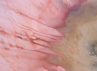 Aerial view of structures at Hutt Lagoon or Pink Lake near Port Gregory in Western Australia, Pink color created naturally by bacteria and harvested in ponds for beta-carotene