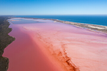 Aerial view of Hutt Lagoon or Pink Lake near Port Gregory in Western Australia, Pink color created naturally by bacteria and harvested for beta-carotene